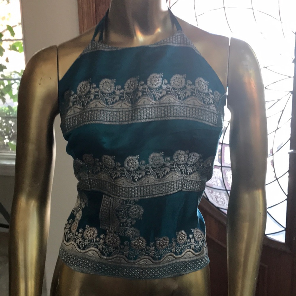 Top with neck tie and embroidered flowers